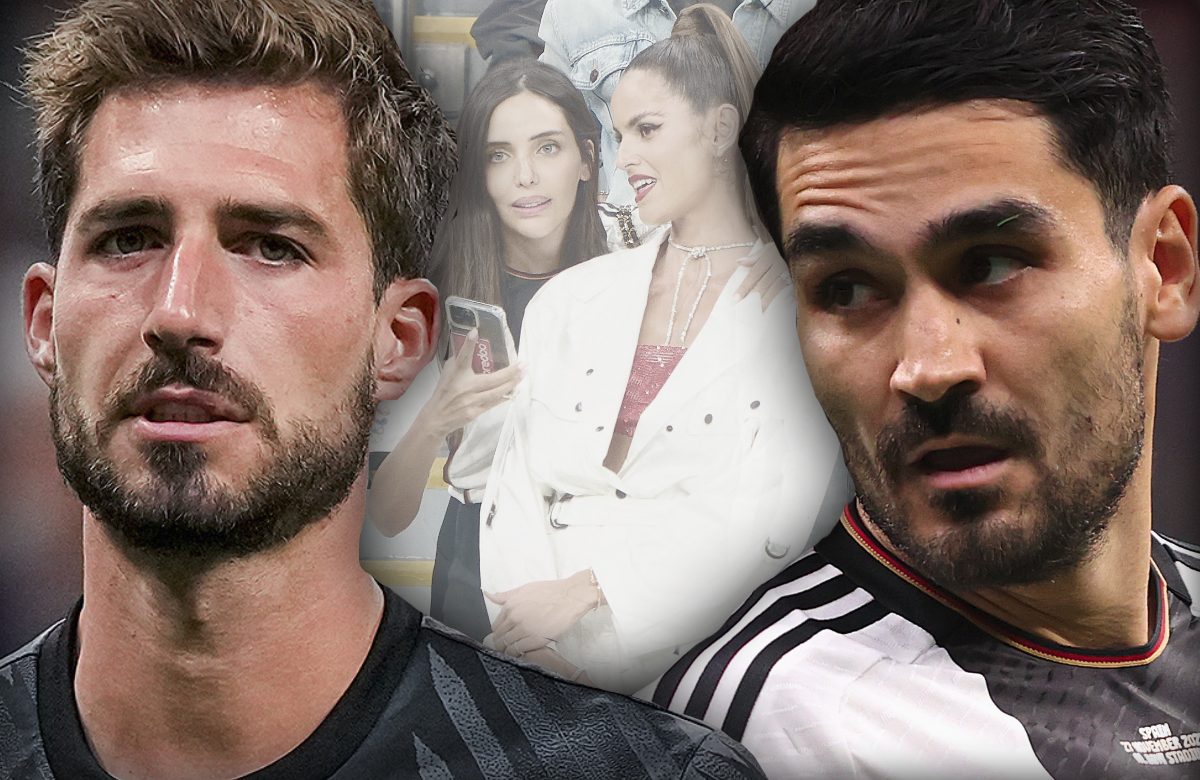 WM 2022 in Katar: Kevin Trapp und Ilkay Gündogan - im Hintergrund die Spielerfrauen Sara Gündogan und Izabel Goulart in Katar auf der Tribüne