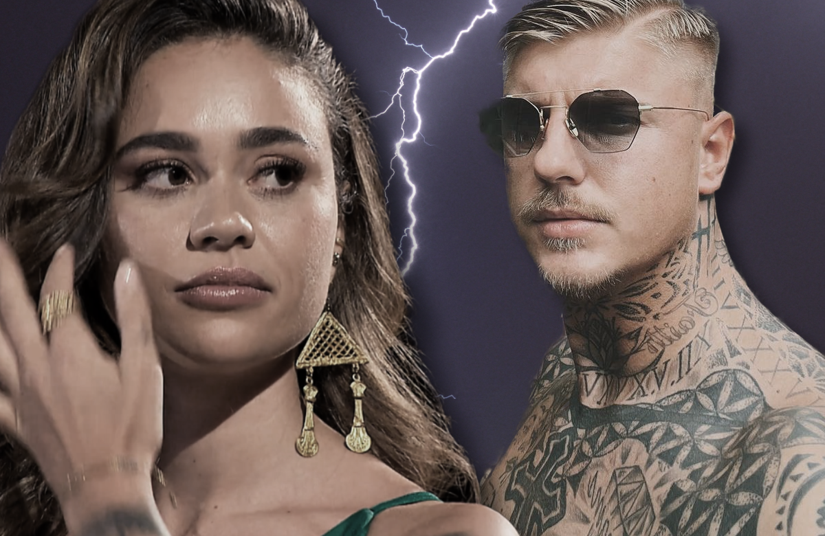 Melissa Damilia und Paco Herb gucken ernst, in der Mitte ein Blitz