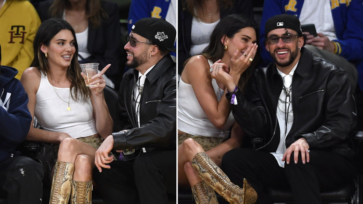 Kendall Jenner und Bad Bunny sitzen bei einem Basketballspiel im Publikum