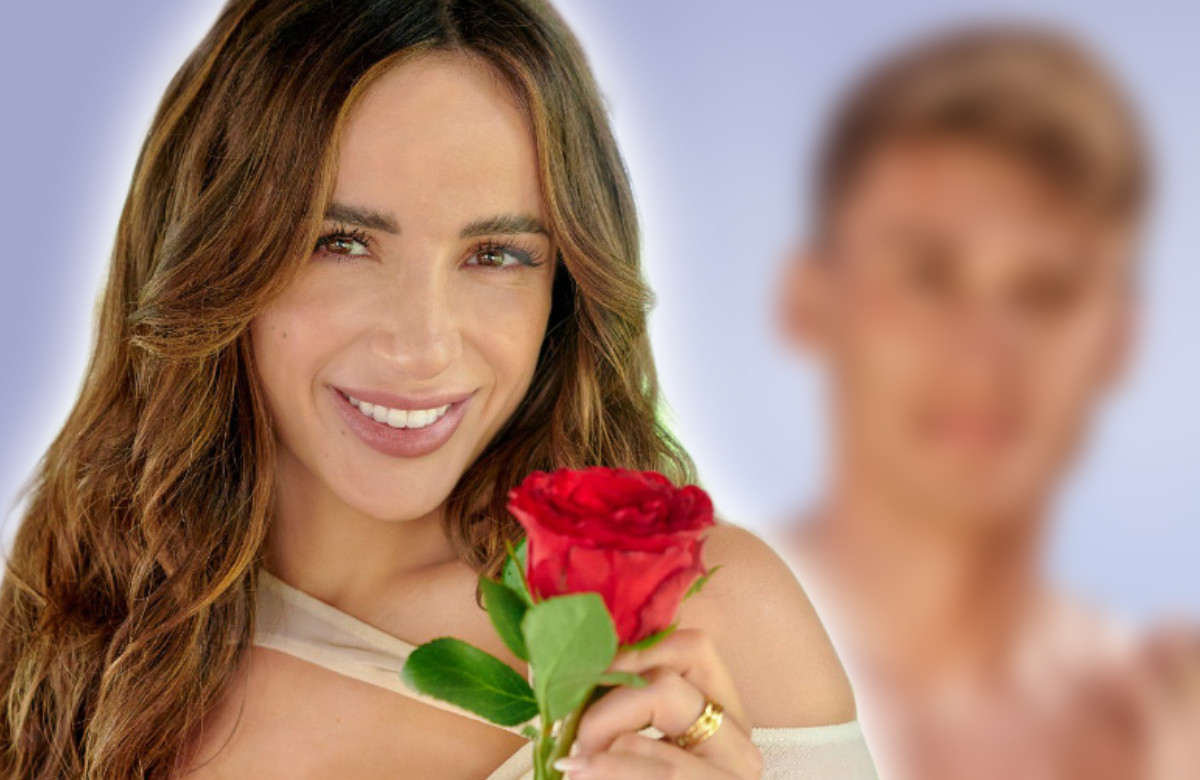 Jennifer Saro mit einer Rose, Fynn Lukas Kunz verschwommen