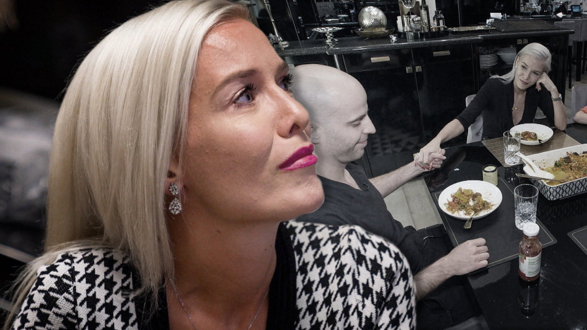 Oksana Kolenitchenko sieht traurig aus, im Hintergrund hält sie die Hand ihres Mannes Daniel