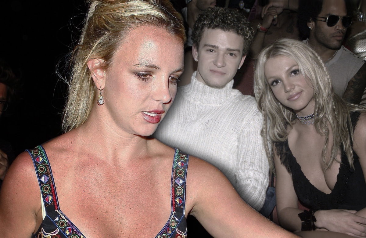 Britney Spears sieht fertig aus, ein Bild von ihr mit Justin Timberlake ist im Hintergrund zu sehen