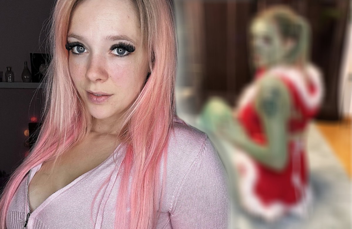 Anne Wünsche mit rosa Haaren, im Hintergrund sieht man sie verschwommen als Grinch verkleidet