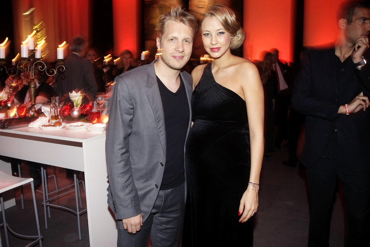 Oliver Pocher und seins damals schwangere Frau Sandy Meyer-Wölden auf einem Event.