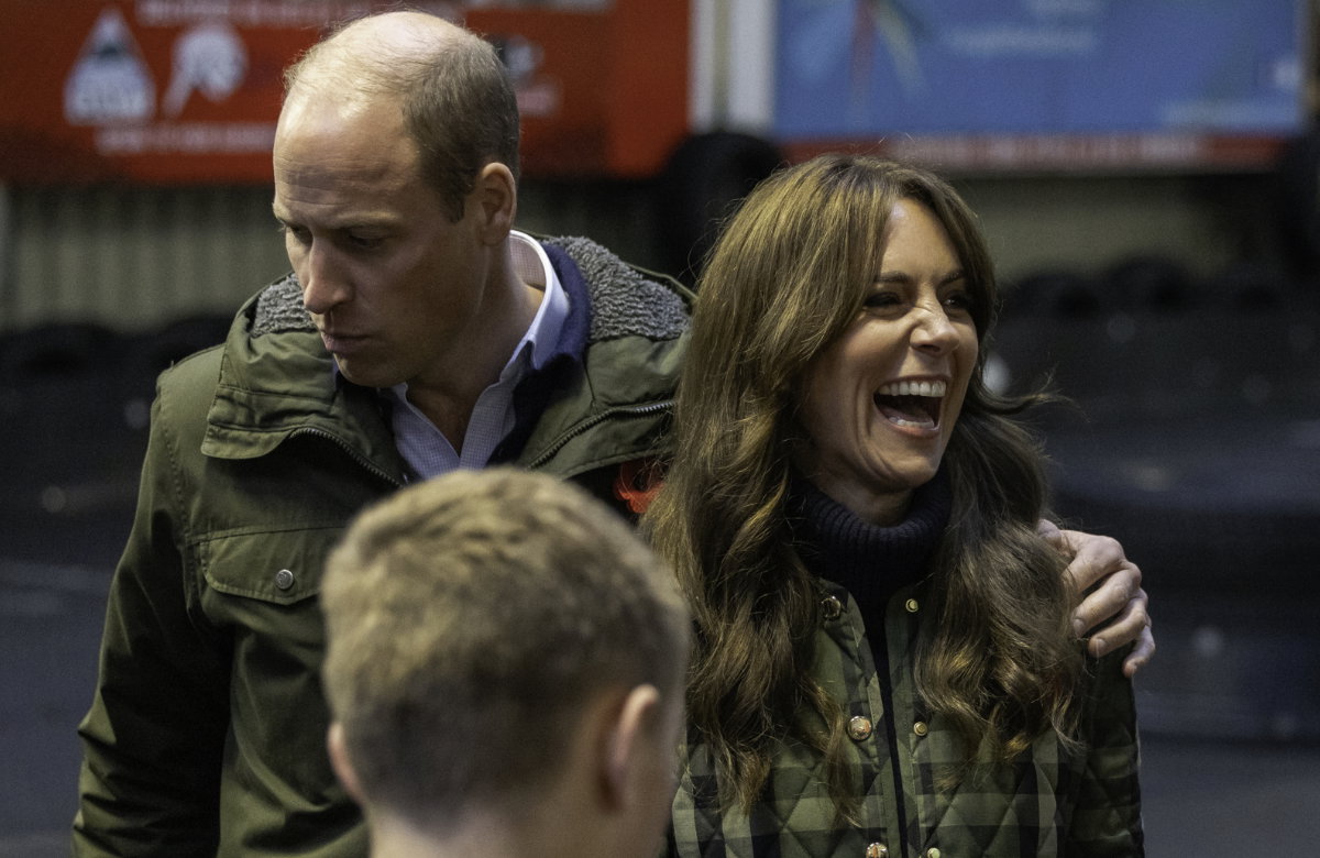 Prinz William und Prinzessin Kate lachen.