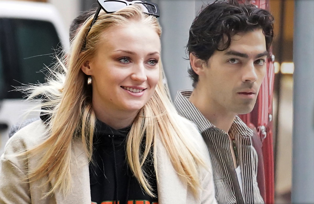 Sophie Turner lächelt, Joe Jonas sieht schockiert aus