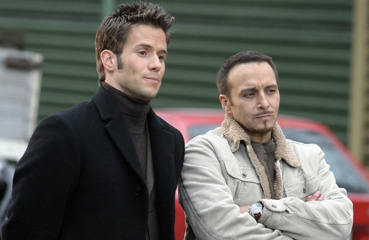 Christian Oliver und Erodgan Atalay stehen nebeneinander und blicken ernst