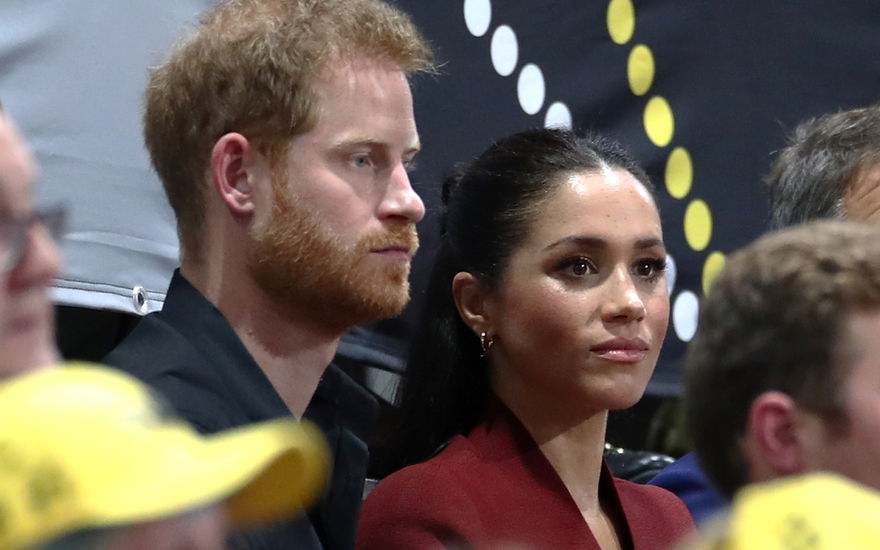 Prinz Harry und Herzogin Meghan sehen niedergeschlagen aus