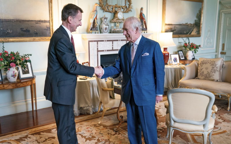 Finanzminister Jeremy Hunt und König Charles III.