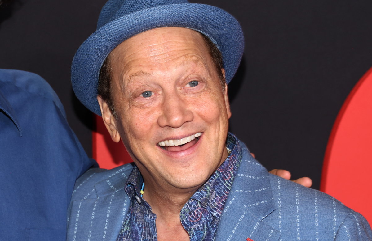 Rob Schneider lacht