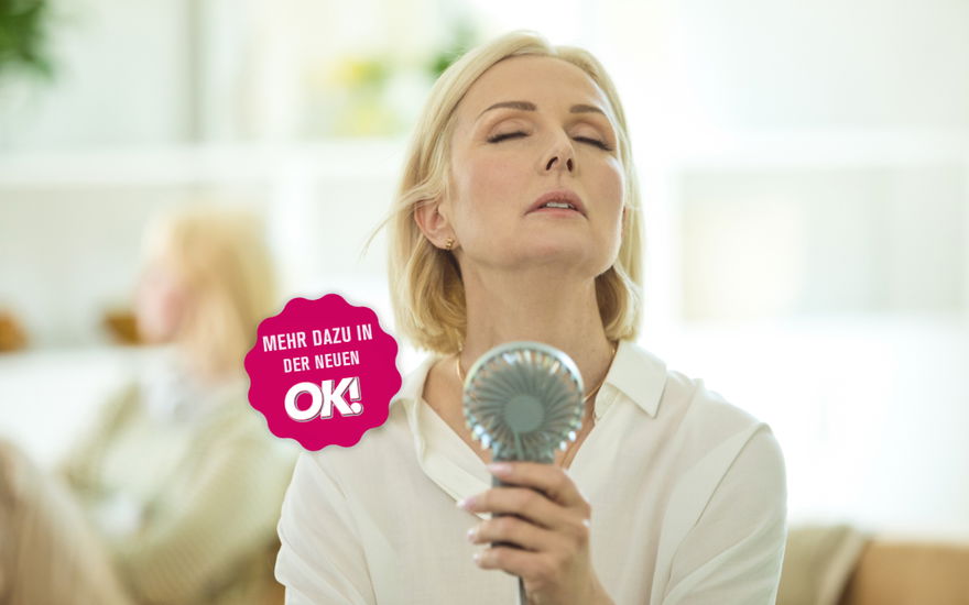 Frau kühlt sich ab