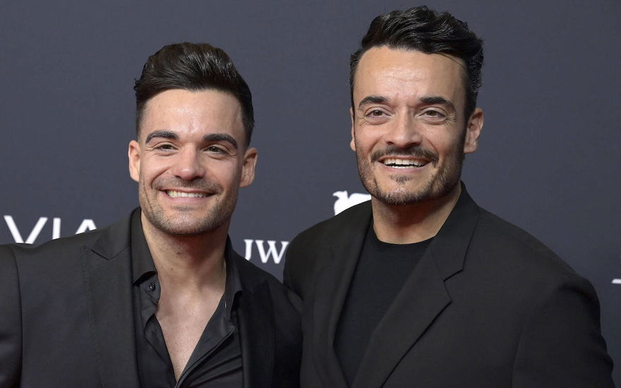 Stefano Zarrella und Giovanni Zarrella lächeln