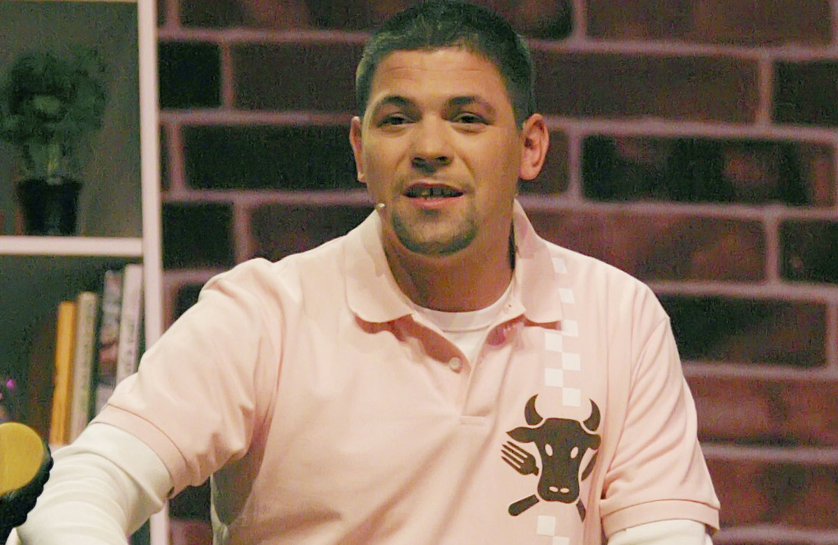 Tim Mälzer mir rosa Shirt