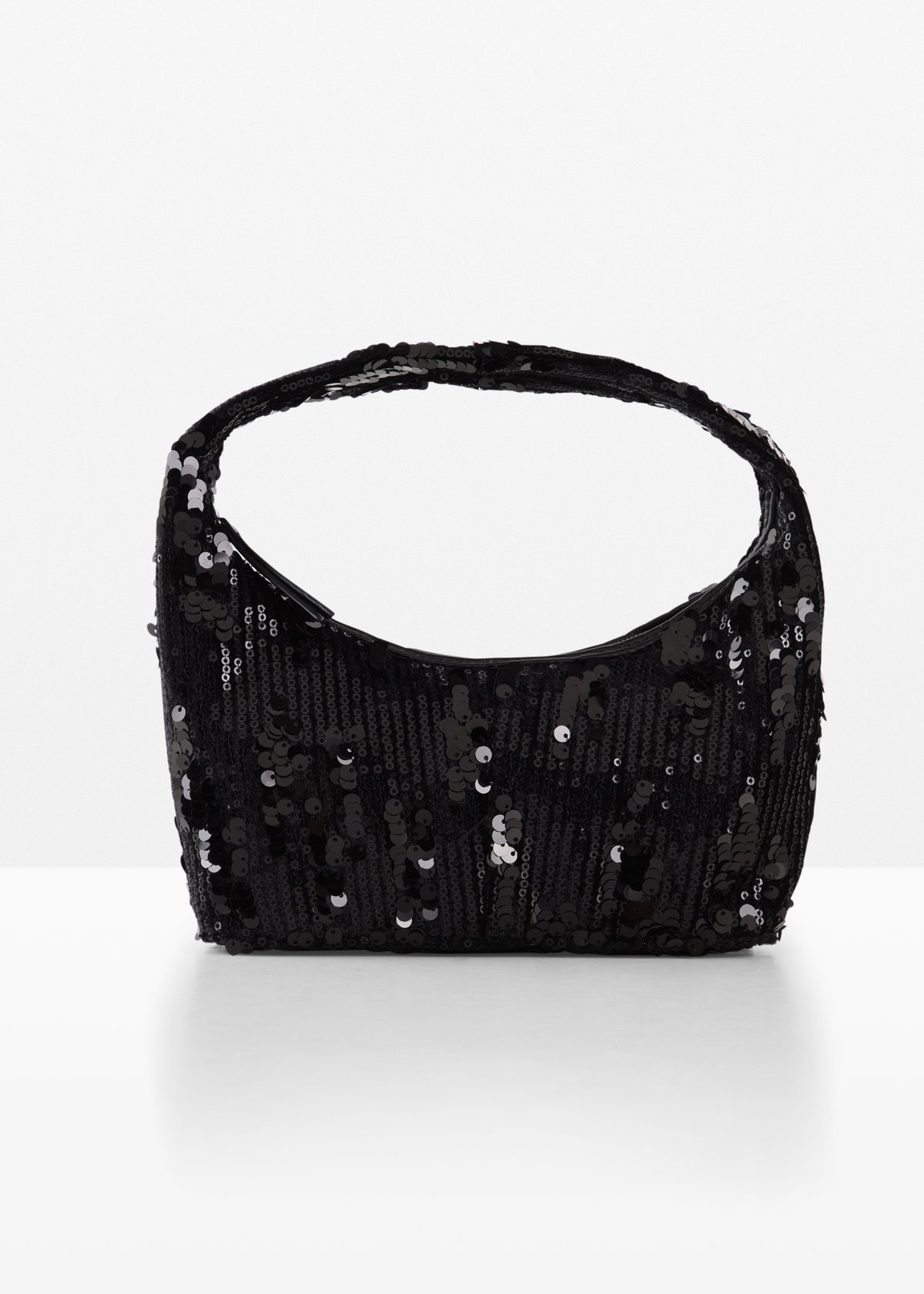 Die Handtasche mit Pailletten ist das i-Tüpfelchen jedes Outfits.