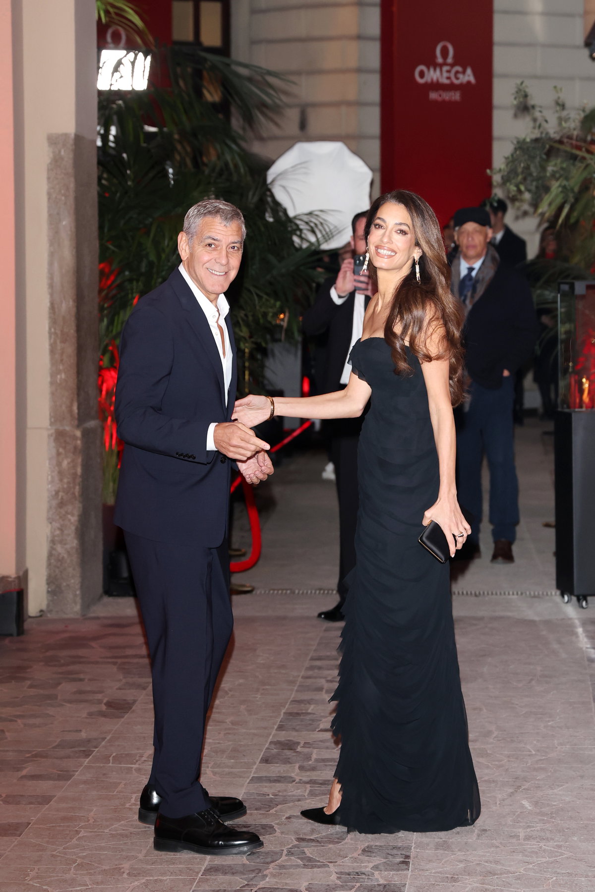 George Clooney und Amal bei Opening night im OMEGA House im Rahmen der Olympischen Spiele