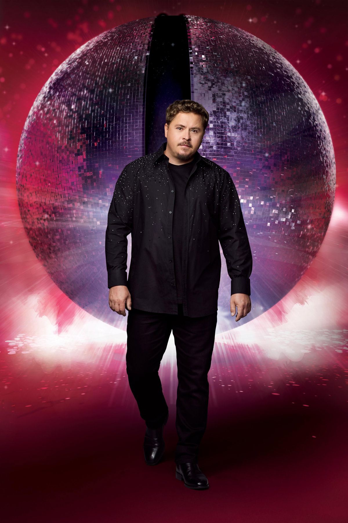 Gustav Schäfer vor Discokugel