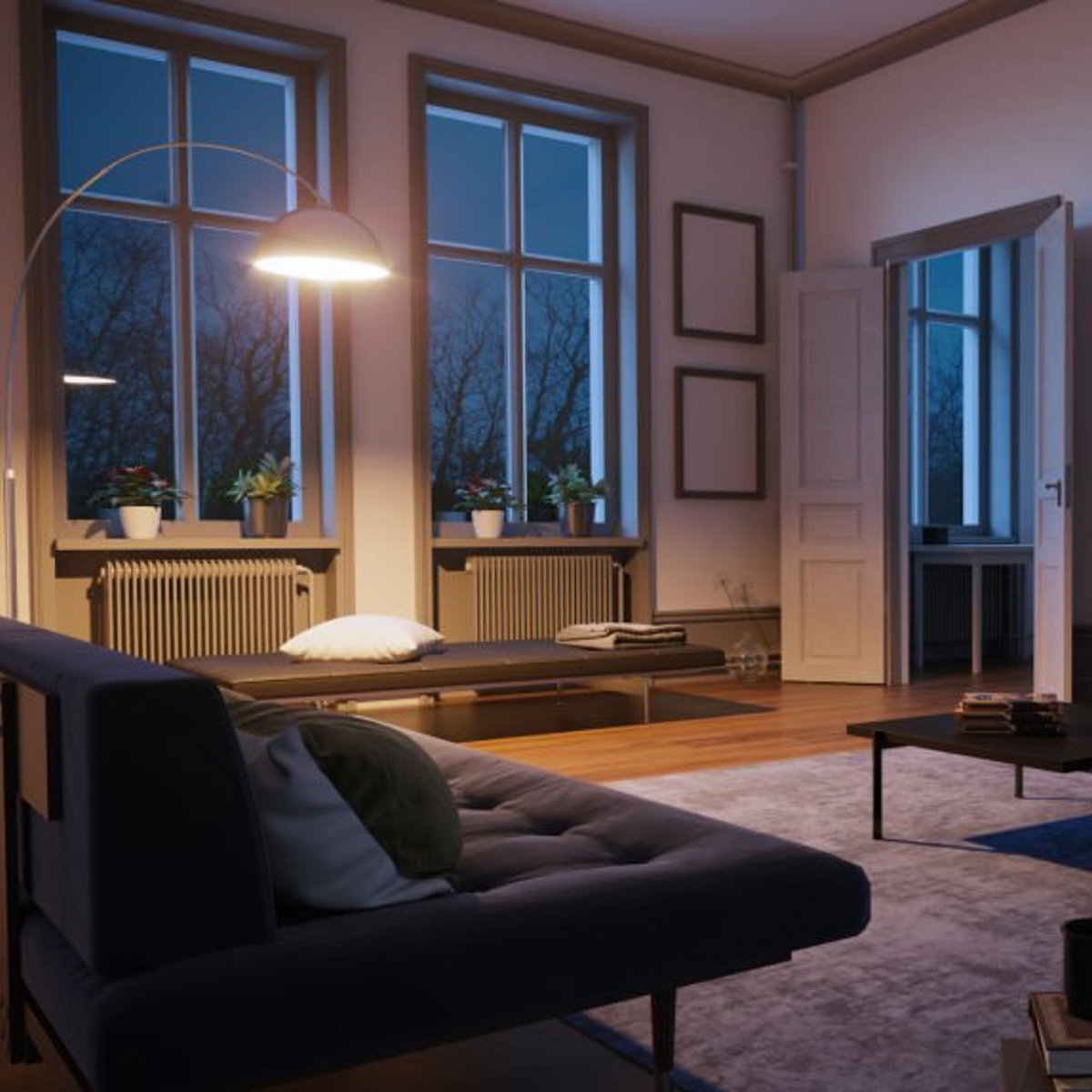 Ein Wohnzimmer mit einem warmen Licht am Abend