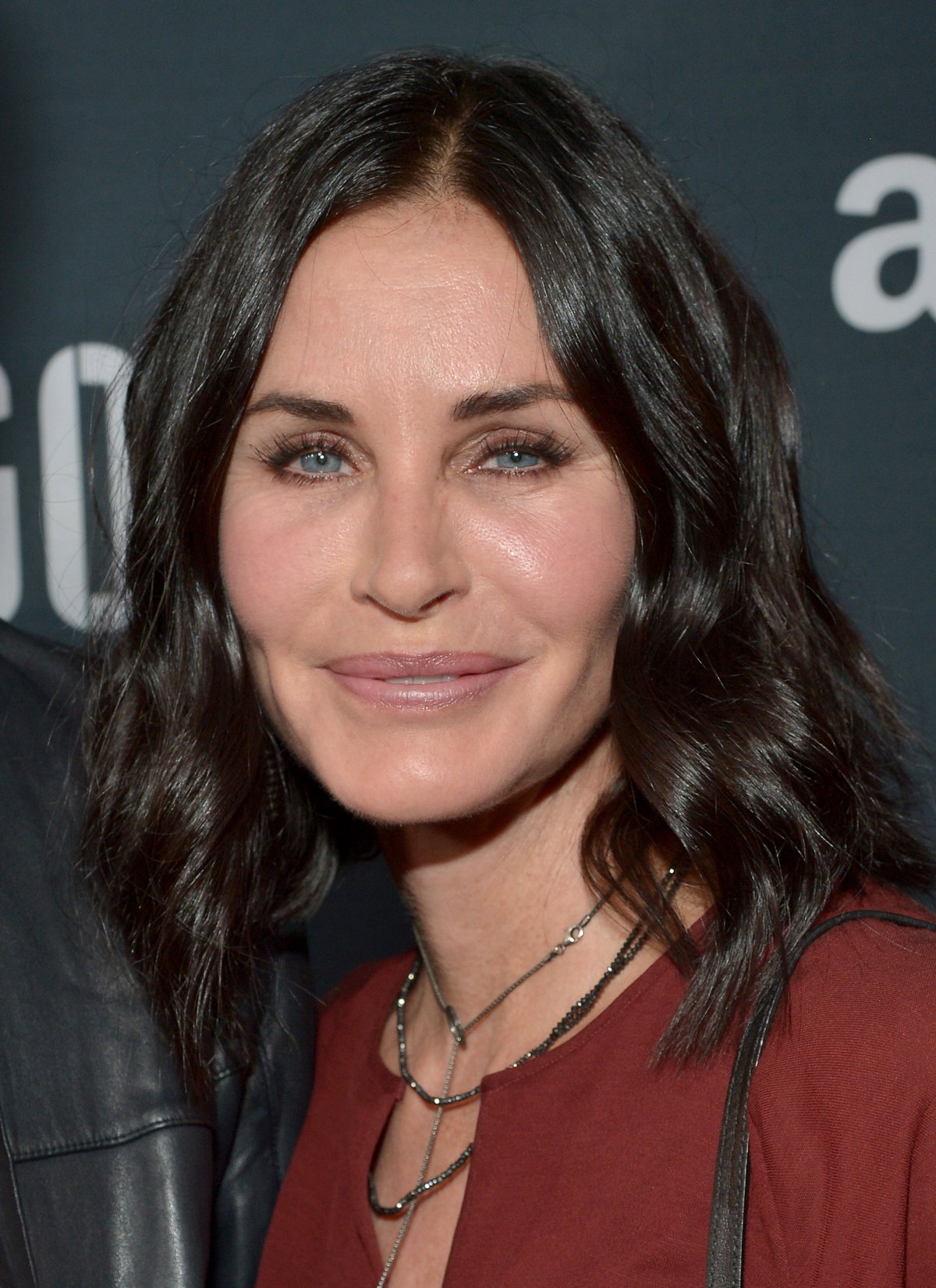 Courteney Cox lächelt