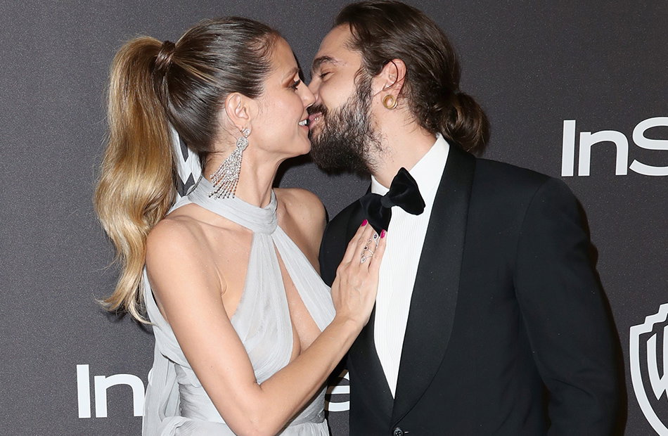 Heidi Klum und Tom Kaulitz küssen sich.
