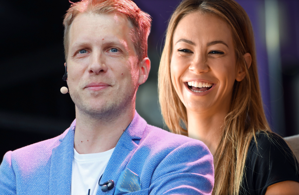 Oliver Pocher und Sandy Meyer-Woelden schauen glücklich in die Kamera