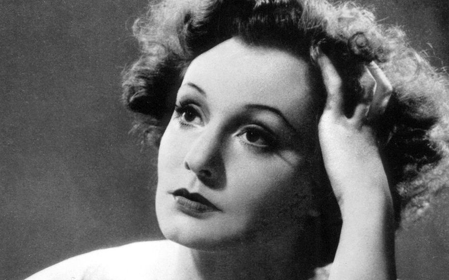 Zarah Leander in Schwarzweiß: Potrait, auf dem sie traurig in die Ferne schaut