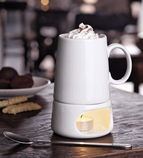 Trinkbecher: Mit Stövchen und Löffel aus Edelstahl. Preis 9,99 Euro