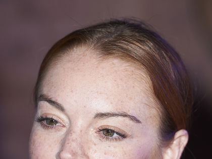 Lindsay Lohan: Botox-Schock! Was ist mit ihrem Gesicht passiert? - Bei der Mailänder Fashion-Week sah ihre Mimik wie eingefroren aus
